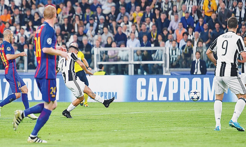 TURIN: Juventus&rsquo; Paulo Dybala (C) shoots to score during the Champions League quarter-final first leg against Barcelona at the Juventus Stadium.&mdash;AP