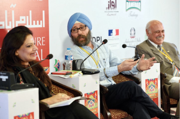 Amardeep Singh speaks at the launch of his book Lost Heritage: The Sikh Legacy in Pakistan on Saturday. F.S. Aijazuddin and moderator Reema Abbasi are also seen. — White Star