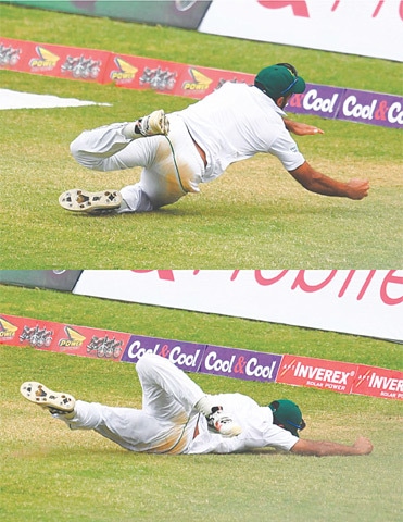 KINGSTON: Wahab Riaz takes a stunning catch in this combo to remove West Indies&rsquo; all-rounder Roston Chase during the first Test at Sabina Park.&mdash;AFP