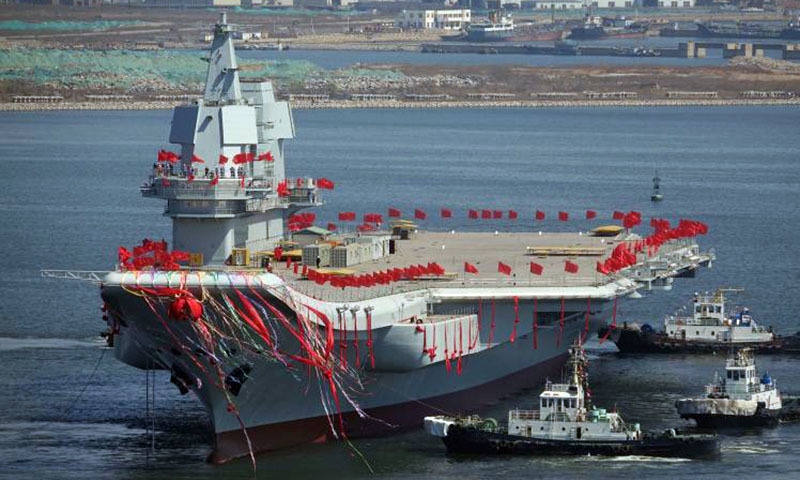 China's first domestically built aircraft carrier is seen during its launching ceremony.─Reuters