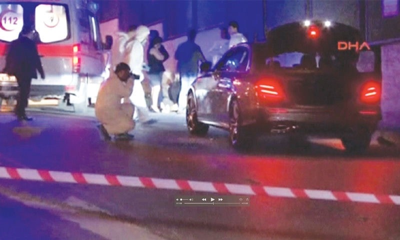 ISTANBUL: A forensic investigator photographs the victims&rsquo; car at the scene of the shooting.&mdash;Reuters