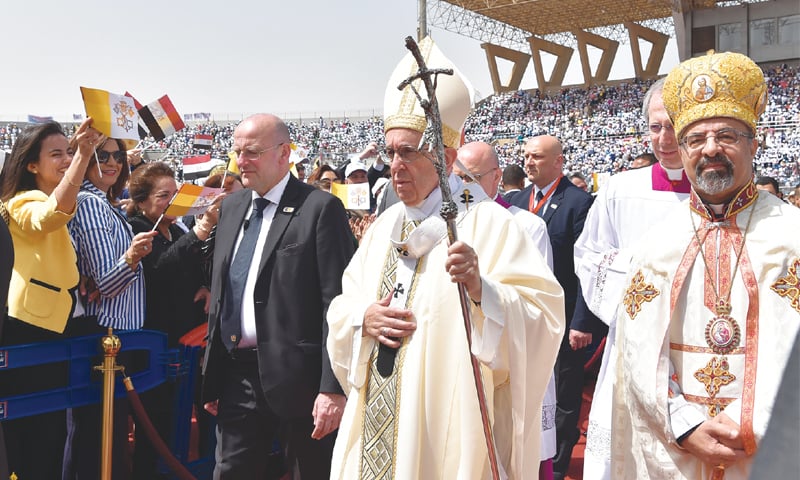 CAIRO: Pope Francis and Coptic Catholic Patriarch of Alexandria Ibrahim Isaac Sidrak (right) during a mass at a stadium on Saturday.—AFP CAIRO: Pope Francis and Coptic Catholic Patriarch of Alexandria Ibrahim Isaac Sidrak (right) during a mass at a stadium on Saturday.—AFP