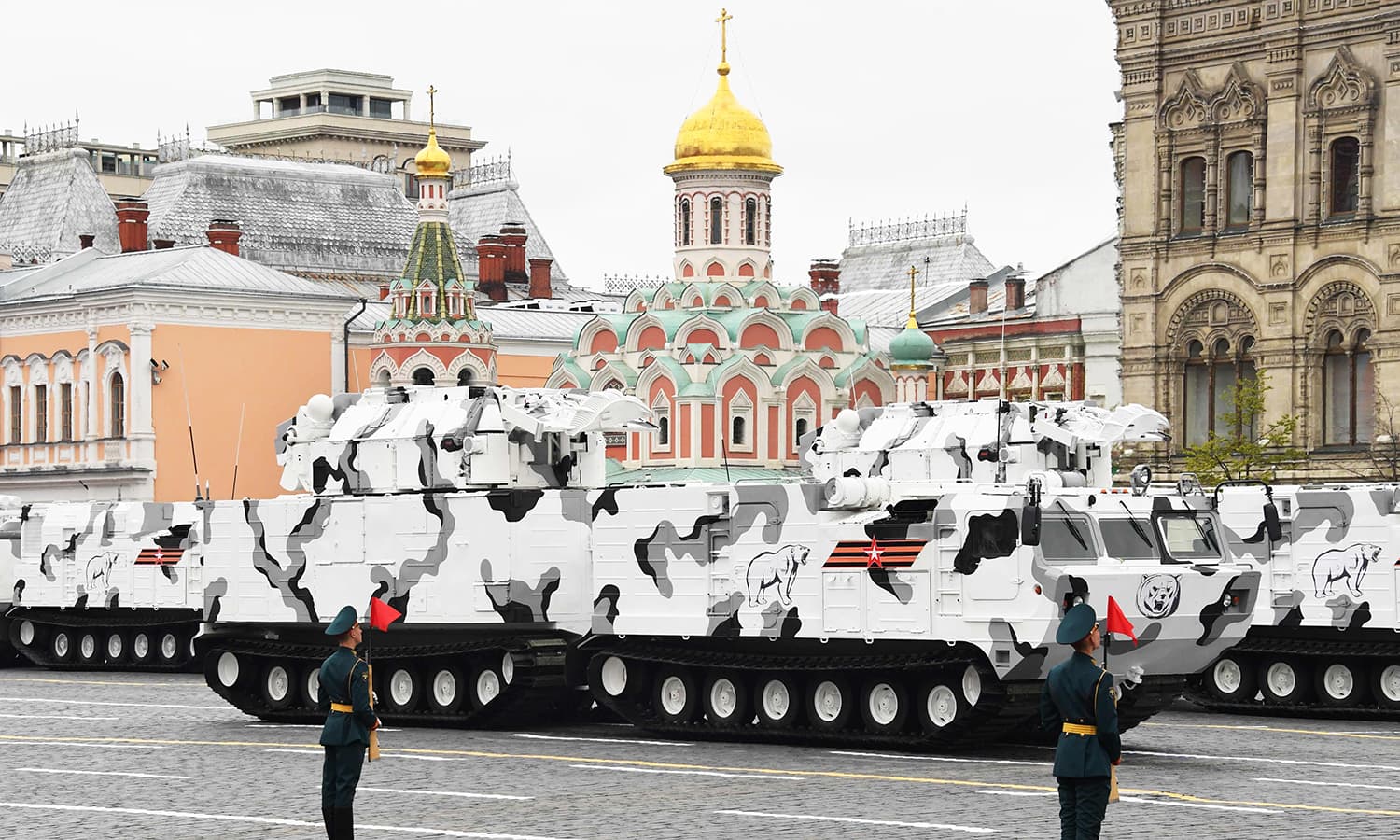 Russian TOR-M2 tactical surface-to-air missile systems of the Arctic Air Defence Division ride through Red Square. -AFP