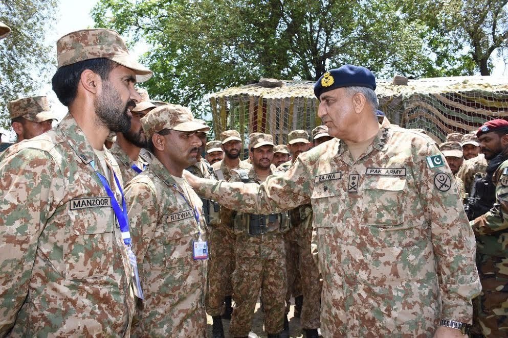 Gen Bajwa meeting troops deployed along the LoC. — Tariq Naqash