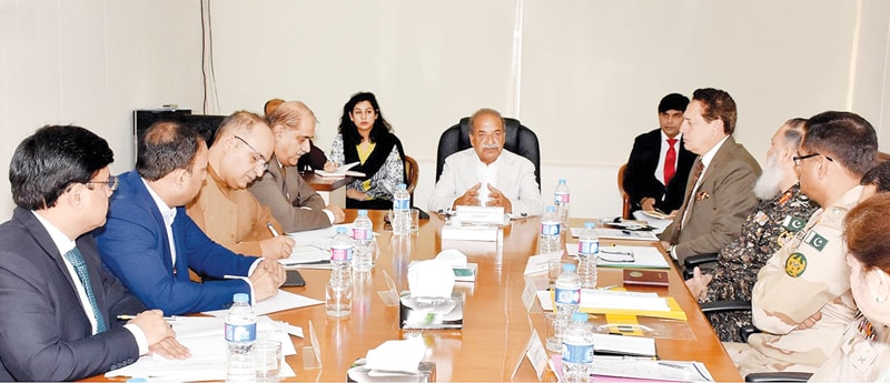 ISLAMABAD: Adviser to the Prime Minister on Aviation Sardar Mehtab Abbasi chairing a meeting on Friday.—INP