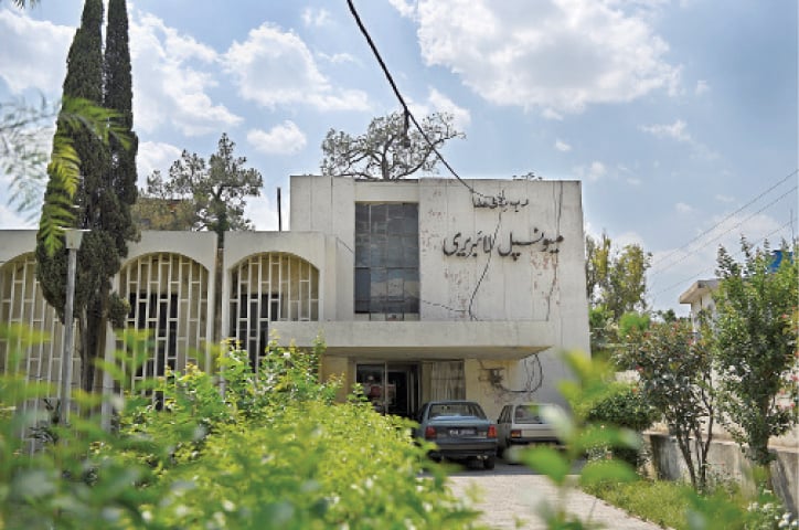 The Rawalpindi Municipal Library has been standing tall for more than a 100 years adjacent to Liaquat Bagh. — Photos by Tanveer Shahzad