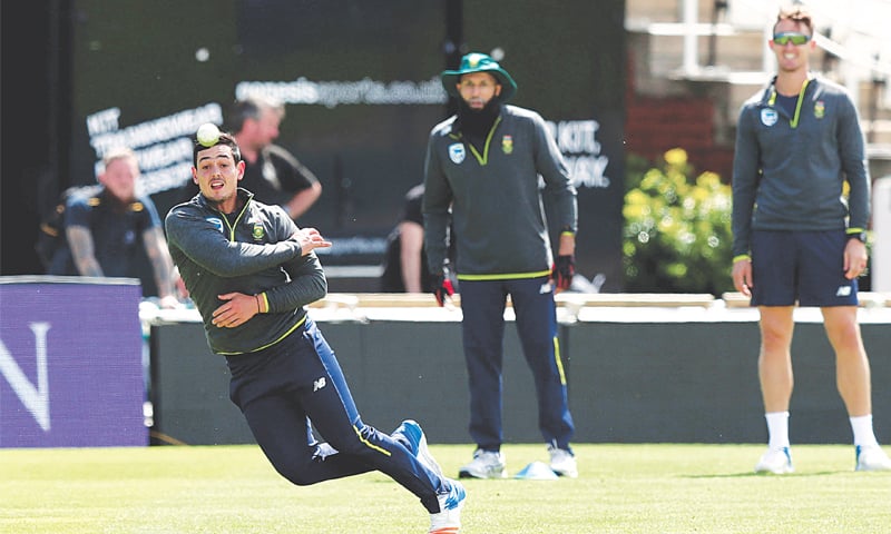 LEEDS: South African wicket-keeper Quinton de Kock throws the ball during a practice session at Headingley on Tuesday.&mdash;AP