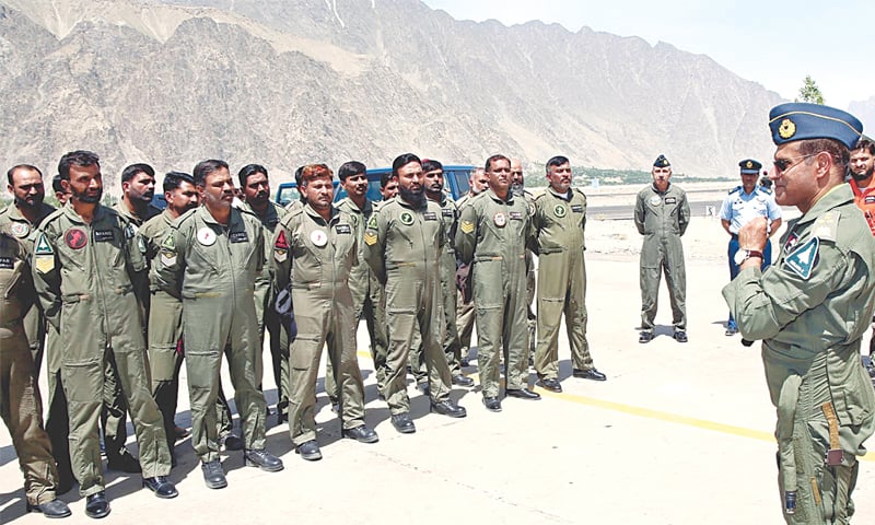 GILGIT-BALTISTAN: Chief of the Air Staff Air Chief Marshal Sohail Aman interacting with the ground crew at PAF Base Qadri after flying an exercise mission in Mirage aircraft.—INP