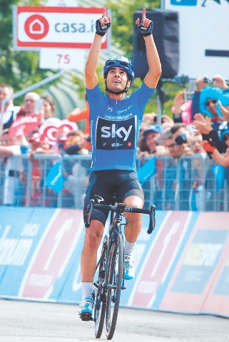 PIANCAVALLO: Spanish cyclist Mikel Landa of Team Sky celebrates as he crosses the finish line to win the 19th stage of Giro d’Italia on Friday.—AFP
