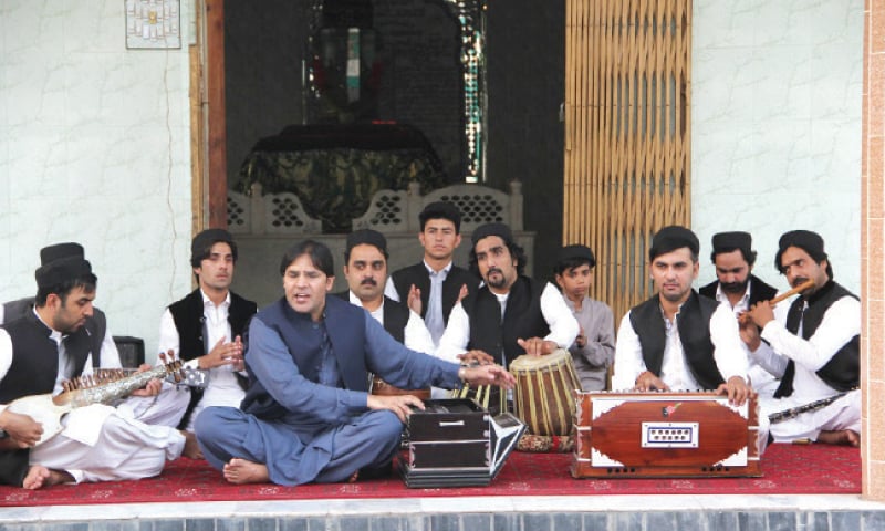 Karan Khan sings qawwali at the shrine of Khawaja Syed Abdul Sattar Shah in Peshawar. — Dawn Karan Khan sings qawwali at the shrine of Khawaja Syed Abdul Sattar Shah in Peshawar. — Dawn