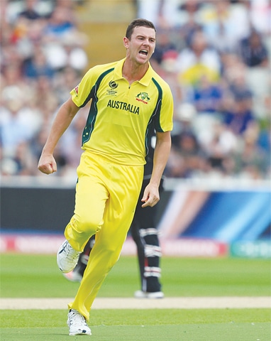 AUSTRALIAN pacer Josh Hazlewood celebrates after taking the wicket of New Zealand&rsquo;s Martin Guptill.&mdash;AP