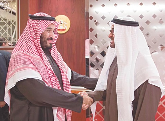 SAUDI deputy crown prince Mohammed bin Salman (left) shakes hands with Crown Prince of Abu Dhabi Sheikh Mohamed bin Zayed.