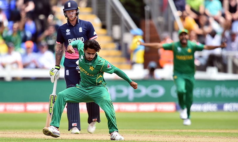 Hasan Ali celebrates taking the wicket of England's Eoin Morgan for 33 runs.— AFP