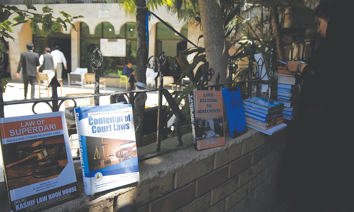 A bookstore outside District and Sessions Court, Rawalpindi | Mohammad Asim, White Star