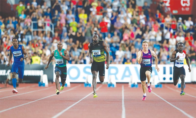 OSTRAVA: Usain Bolt (C) competes to win the 100-metre event at the Golden Spike meeting.—AP OSTRAVA: Usain Bolt (C) competes to win the 100-metre event at the Golden Spike meeting.—AP