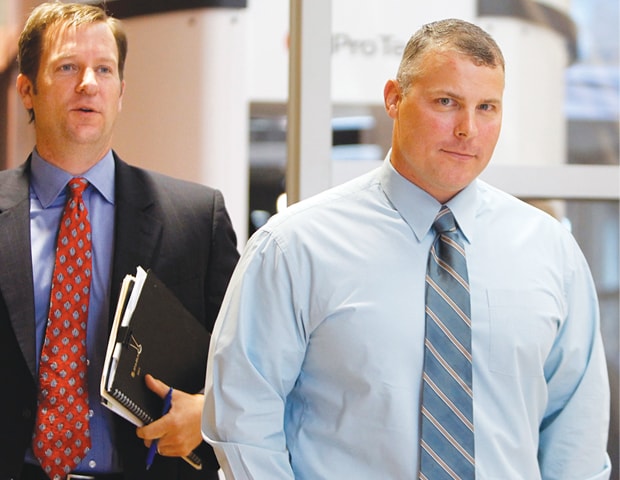 In this Oct 4, 2011 file photo former CIA contractor Raymond Davis (right) arrives at the Douglas County Courthouse in Castle Rock for a hearing on a felony assault charge.—AP