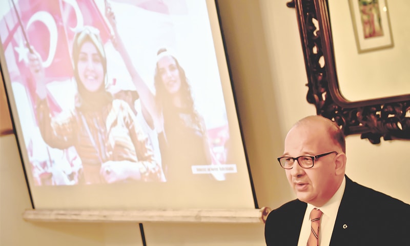 CONSUL General of Turkey in Karachi Murat Mustafa Onart addresses the event on Thursday.&mdash;White Star