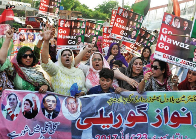 PPP activists raise slogans during a protest in Rawalpindi on Sunday. &mdash; INP