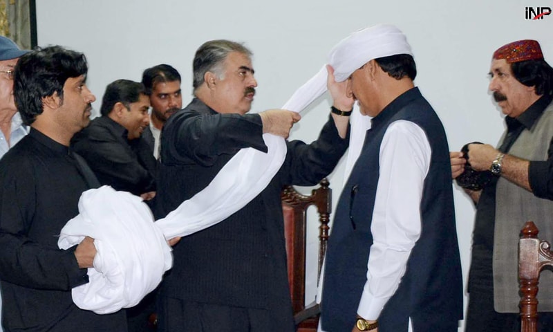QUETTA: Balochistan Chief Minister Nawab Sanaullah Khan Zehri takes part in a ceremony to name Ali Mohammad Jattak the head of the Jattak tribe on Thursday.—INP QUETTA: Balochistan Chief Minister Nawab Sanaullah Khan Zehri takes part in a ceremony to name Ali Mohammad Jattak the head of the Jattak tribe on Thursday.—INP
