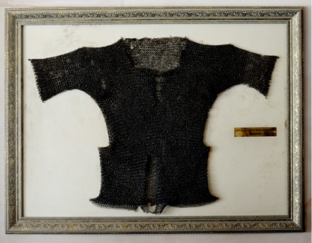 A brass armour shirt from the Mughal era, known as zirah baktar, is displayed in the Gun and Country Club dining hall.