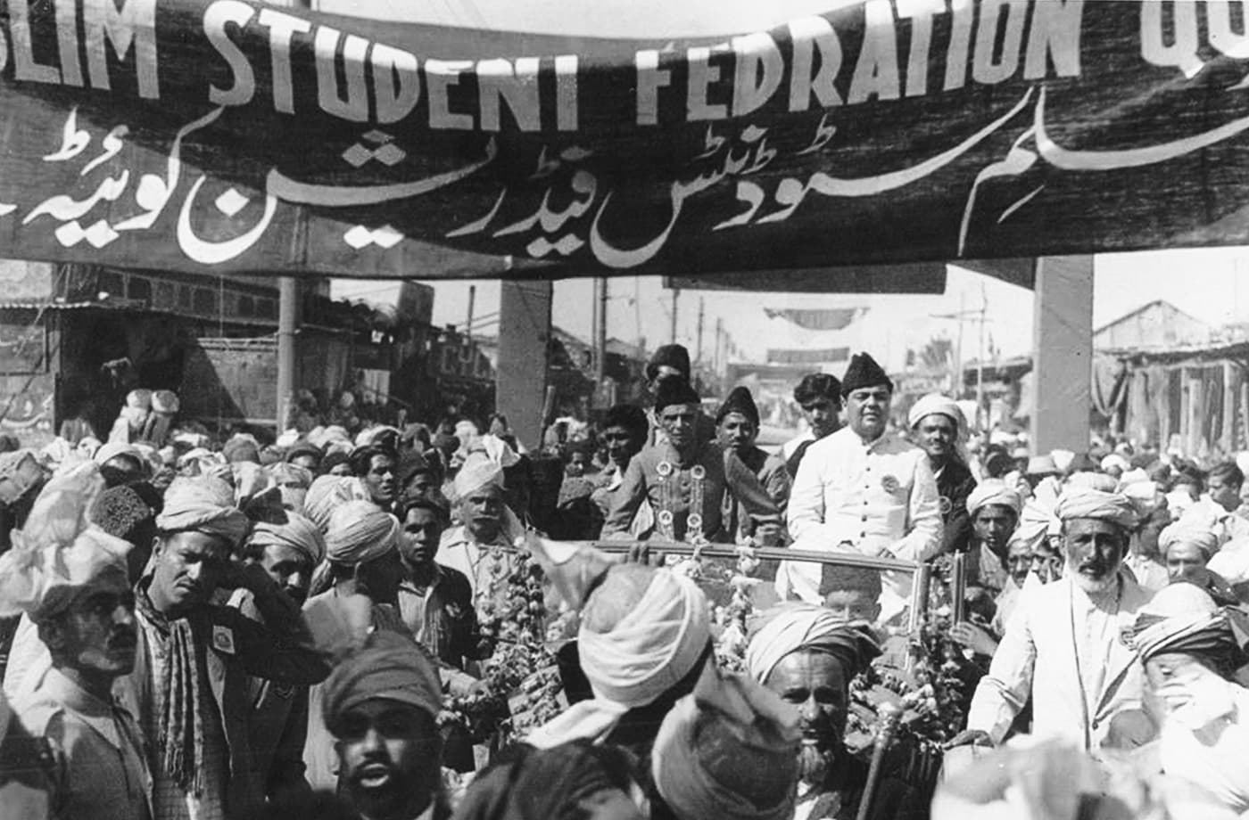 Quaid-i-Azam Mohammad Ali Jinnah and Qazi Isa are cheered by the Muslim Student Federation in Quetta. — Courtesy National Archives Islamabad