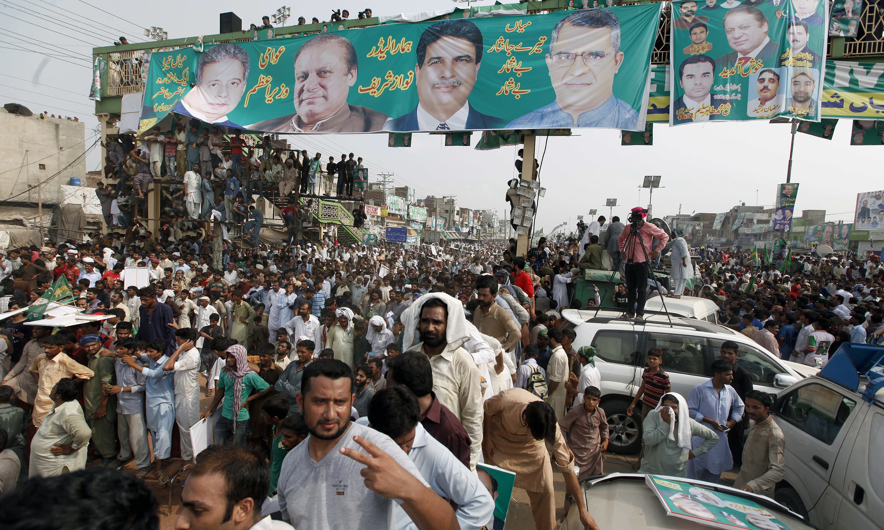 PML-N supporters attend the rally in Muridke. —AP