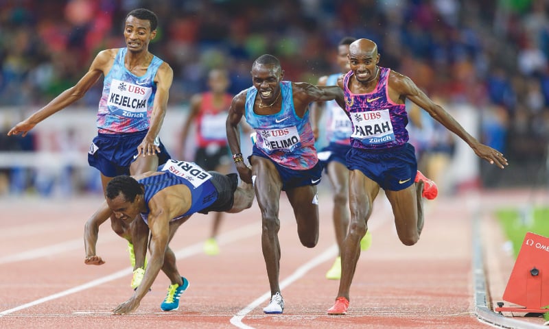 ZURICH: Great Britain&rsquo;s Mohamed Farah (R) crosses the finish line ahead of Paul Chelimo of the US (second R) and Ethiopians Muktar Edris (second L) and Yomif Kejelcha in the 5,000m event at the IAAF Diamond League Weltklasse meeting.&mdash;AFP