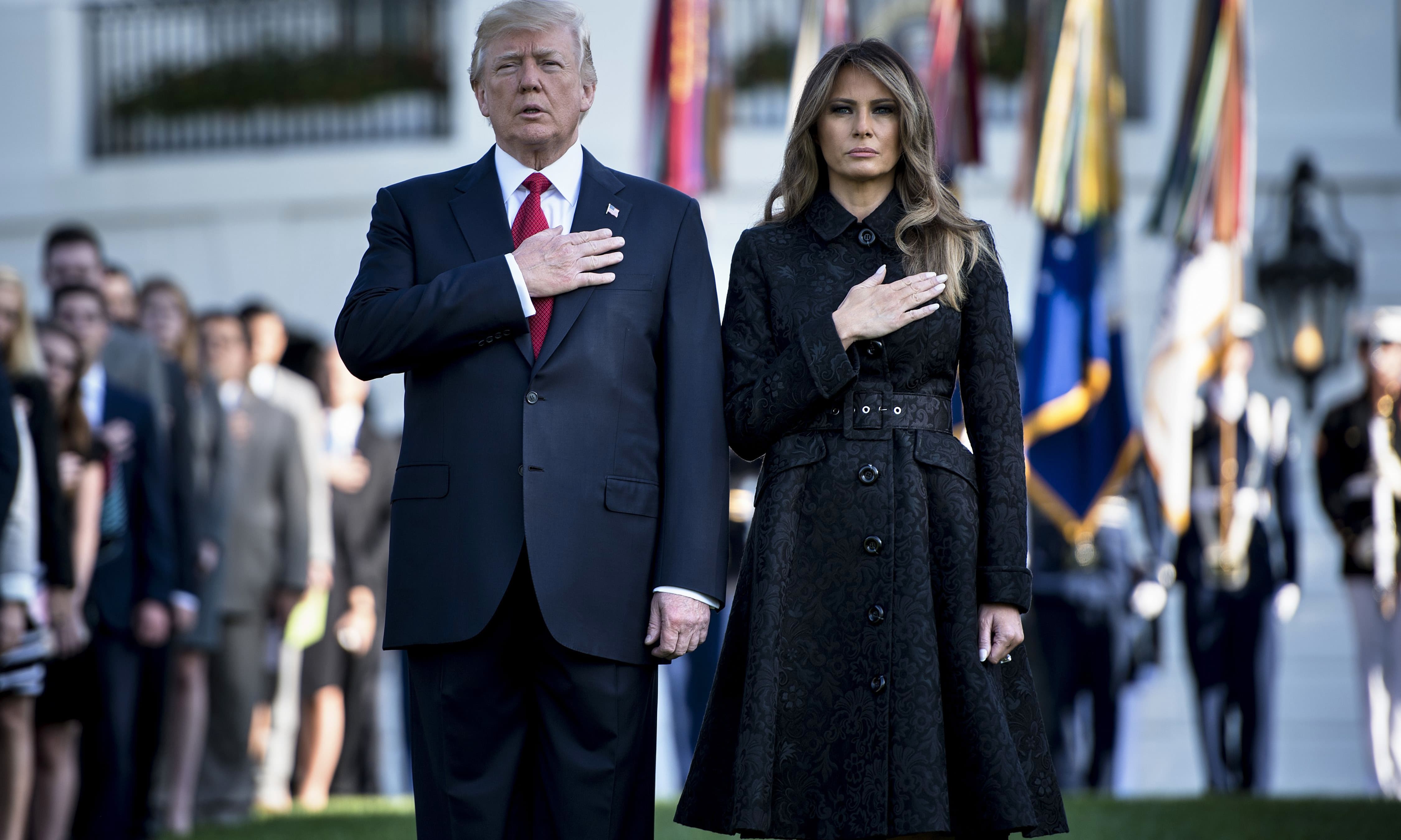 US President Donald Trump and First Lady Melania Trump observe a moment of silence on September 11, 2017 at the White House. —AFP