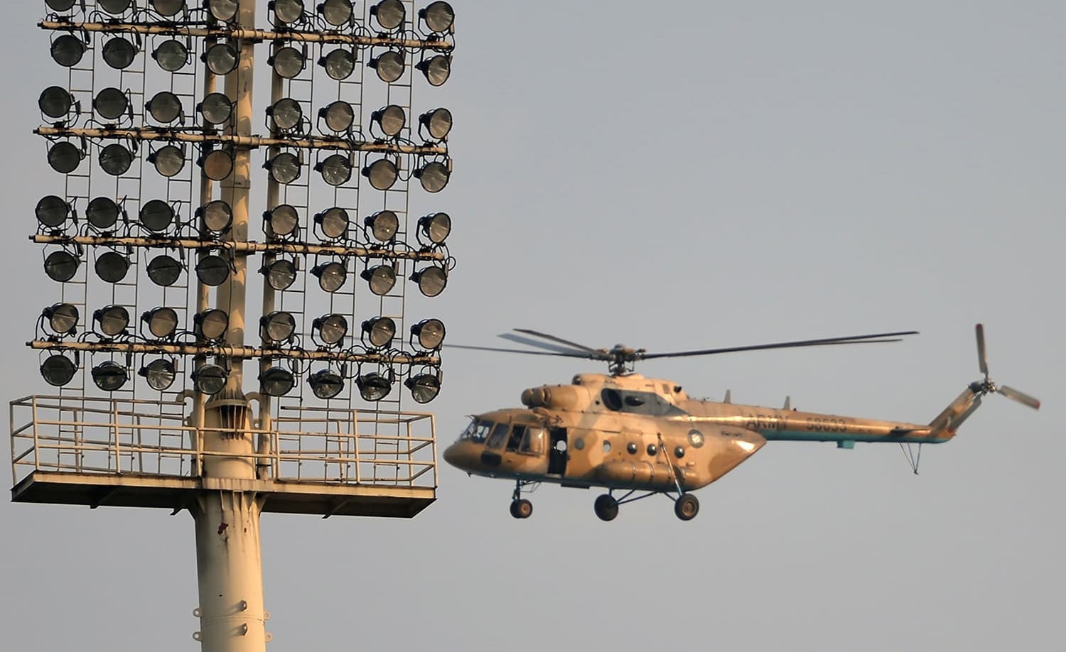 A Pakistan Army helicopter patrols over Gaddafi Stadium before the start of the second T20I. — AFP