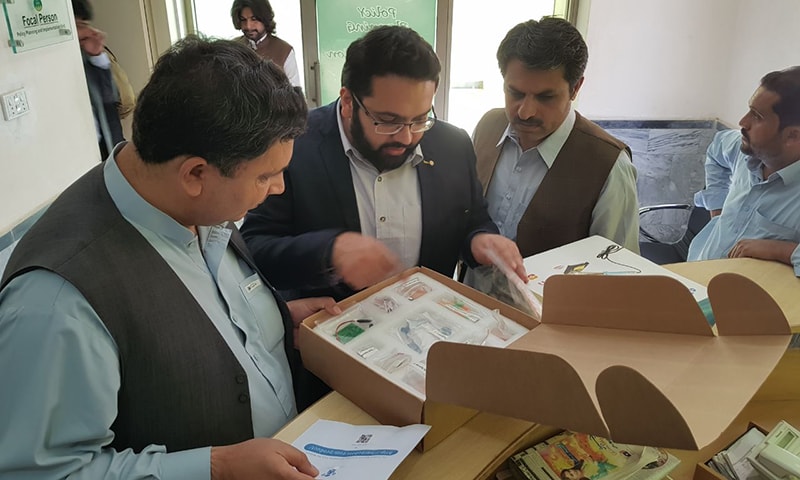 Representatives from robotics companies discuss introduction of robotics-based STEM education in Balochistan.─Photo by author