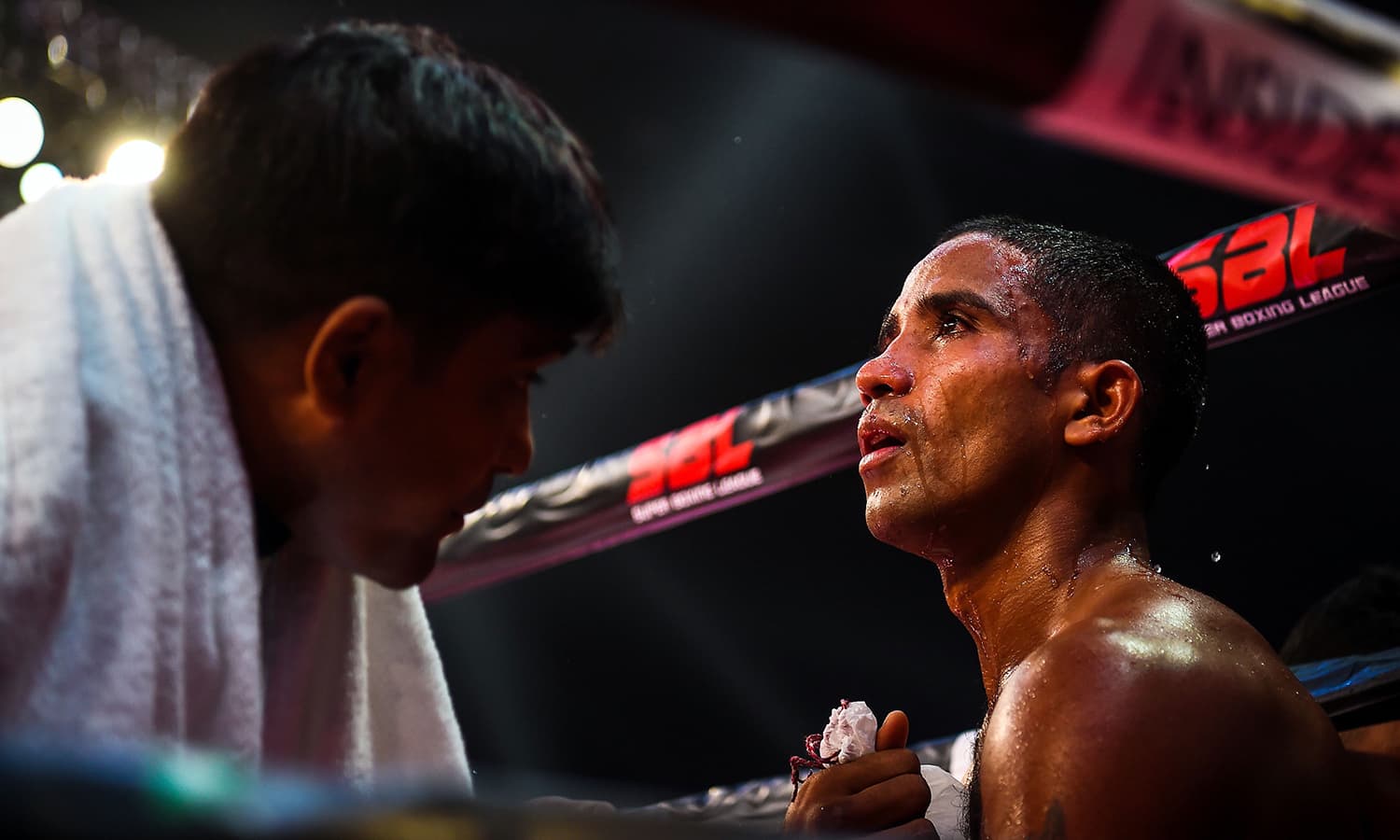 Boxer Venkat Naik with the Bahubali Boxers team rests during a break in his fight at a Super Boxing League event in New Delhi.&mdash; AFP