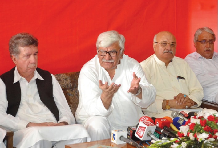 Asfandyar Wali Khan addressing a presser in Peshawar on Tuesday. &mdash; INP