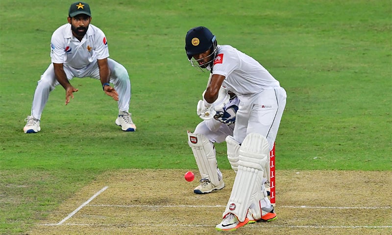 Dinesh Chandimal of Sri Lanka plays a shot during the first day of the second Test cricket match between Sri Lanka and Pakistan at Dubai International Stadium in Dubai on October 6.— AFP Dinesh Chandimal of Sri Lanka plays a shot during the first day of the second Test cricket match between Sri Lanka and Pakistan at Dubai International Stadium in Dubai on October 6.— AFP