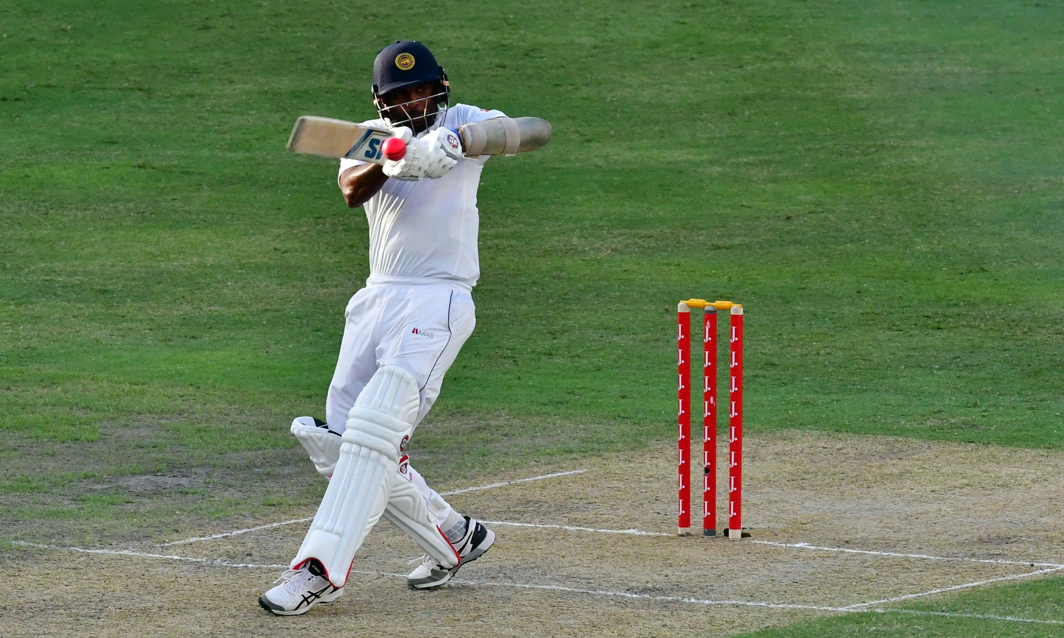 Dilruwan Perera of plays a shot during the second day of the second Test cricket match between Sri Lanka and Pakistan. —AFP