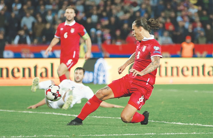 BELGRADE: Aleksandar Prijovic scores a goal against Georgia during their World Cup qualifier at the Rajko Mitic Stadium.&mdash;Reuters