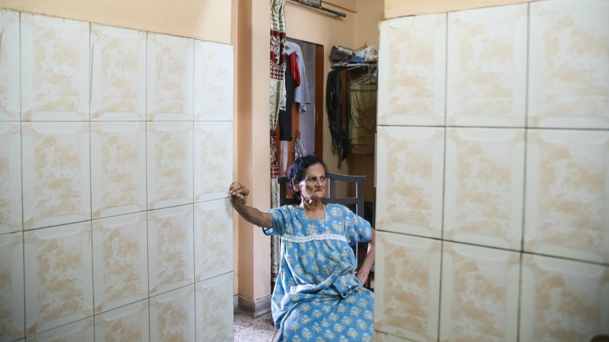 Rita Lobo takes a break to cool down from the heat of the kitchen — Photo by the author