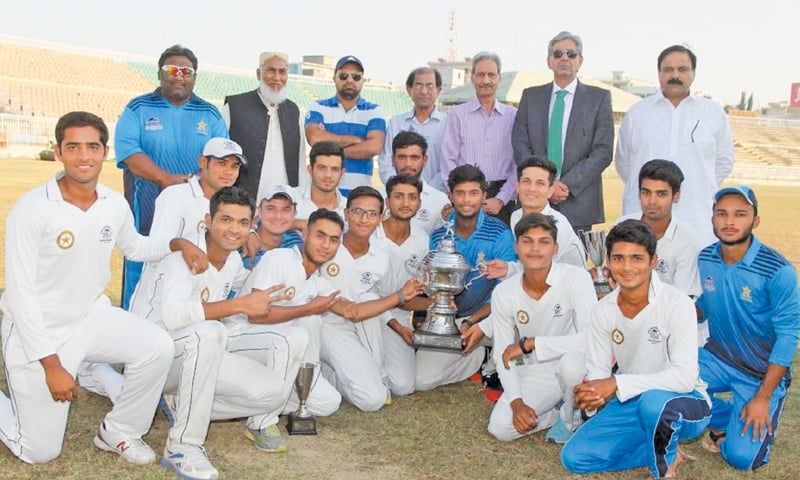 MIRPUR: PCB Under-19 champions Karachi Blues pose with chief guest Ejaz Raza after conclusion of the final at the Mirpur Cricket Stadium on Monday. MIRPUR: PCB Under-19 champions Karachi Blues pose with chief guest Ejaz Raza after conclusion of the final at the Mirpur Cricket Stadium on Monday.