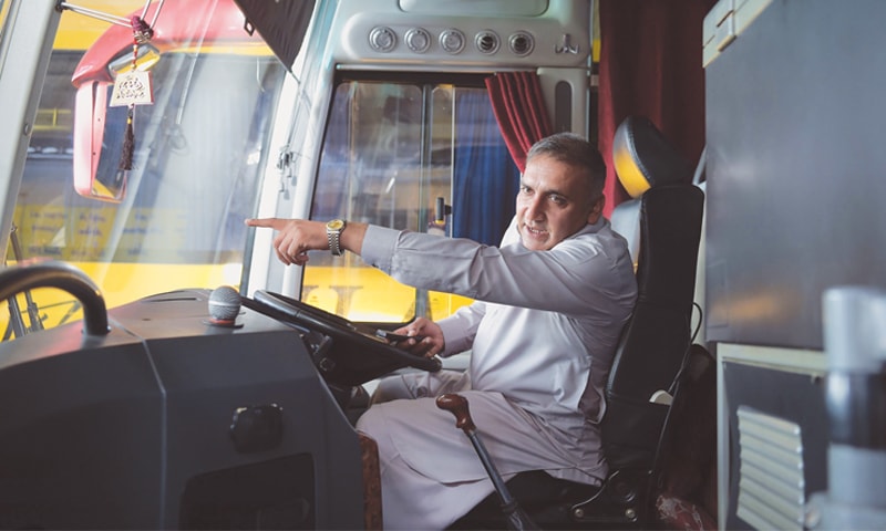Bus driver Meher Mohammad Khalil, who drove the Sri Lankan cricket team to safety when it came under a gun-and-grenade attack by militants in March 2009, preparing to start his shift at a bus terminal in Lahore.&mdash;AFP