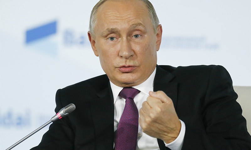 Russian President Vladimir Putin gestures while answering questions at a meeting of the Valdai International Discussion Club in Sochi, Russia. ─ AP Russian President Vladimir Putin gestures while answering questions at a meeting of the Valdai International Discussion Club in Sochi, Russia. ─ AP