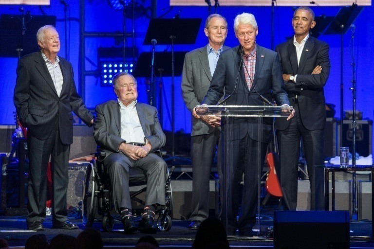 Former Presidents Jimmy Carter, George Bush, George W. Bush, Bill Clinton and Barack Obama speak at "Deep from the Heart: The One America Appeal Concert" in Texas on Saturday.&mdash;AFP