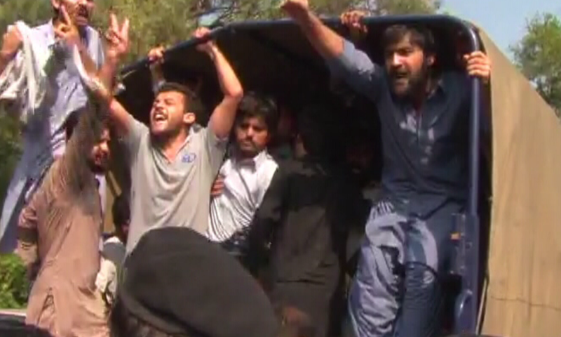 Quaid-e-Azam University students protest against administration on Monday.—DawnNews