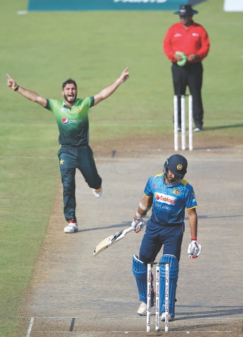 Pakistan paceman Usman Khan Shinwari celebrates after dismissing Sri Lankan batsman Milinda Siriwardana during the fifth ODI on Monday.—AP