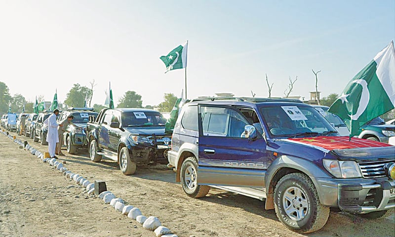 Participants of a peace car rally pass through Bannu on Wednesday. — Online