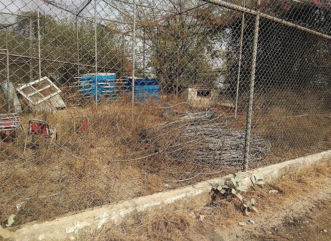 Animal cages at Kund Park have been turned into junkyard. &mdash; Dawn