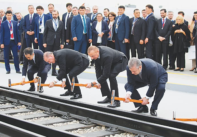 BAKU (Azerbaijan): Turkey&rsquo;s President Recep Tayyip Erdogan (second left), Azerbaijan&rsquo;s President Ilham Aliyev (second right) and Georgia&rsquo;s Prime Minister Giorgi Kvirikashvili (right) inaugurate Baku-Tbilisi-Kars railway at a ceremony here on Monday.&mdash;AP