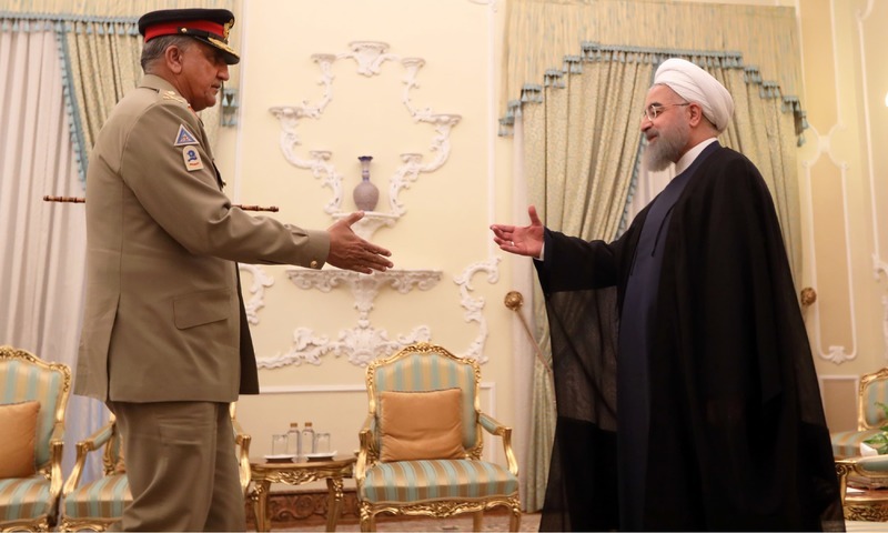 TEHRAN: Army Chief Gen Qamar Javed Bajwa meets Iranian President Hassan Rouhani on Monday.—AFP