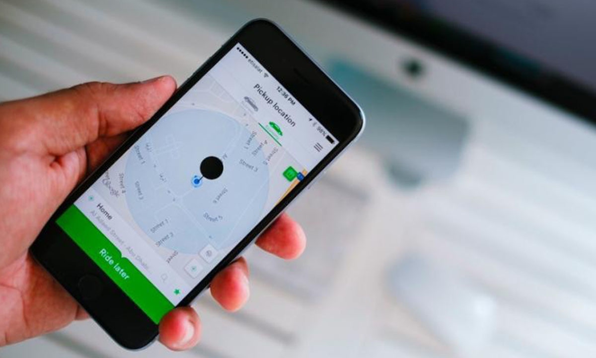 Careem's cellphone application through which customers book and manage rides | AFP