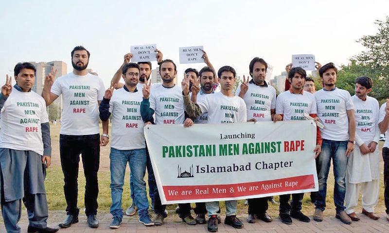 Civil society activists protest outside the National Press Club on Saturday. — INP