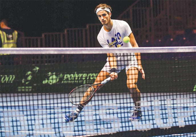 VILLENEUVE DASCQ: France’s Pierre-Hugues Herbert practises during a training session on Wednesday at the Pierre-Mauroy Stadium, ahead of the Davis Cup World Group final against Belgium.—AFP