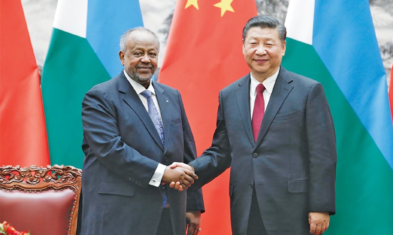 Beijing: Chinese President Xi Jinping (right) shakes hands with his Djiboutian counterpart Ismail Omar Guelleh during a signing ceremony at the Great Hall of the People on Thursday.&mdash;AP